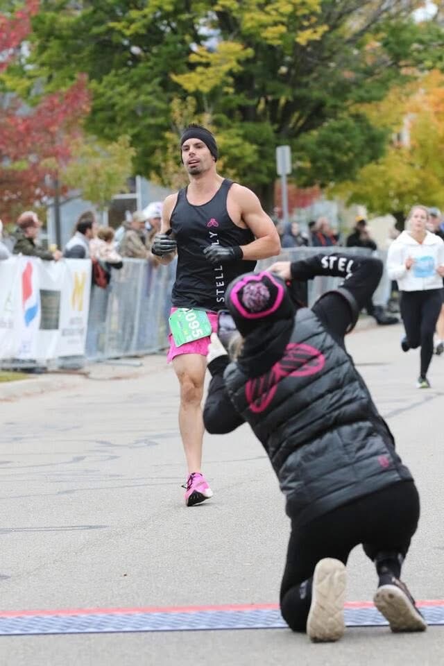 StellaFly runner approaching the finish line