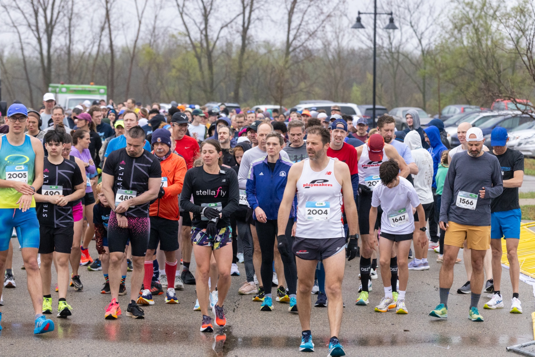 Runners gathering at the start line before a local race